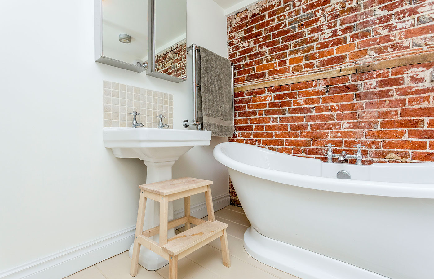 Westcott Construction Bathroom in Old Portsmouth with exposed brick wall