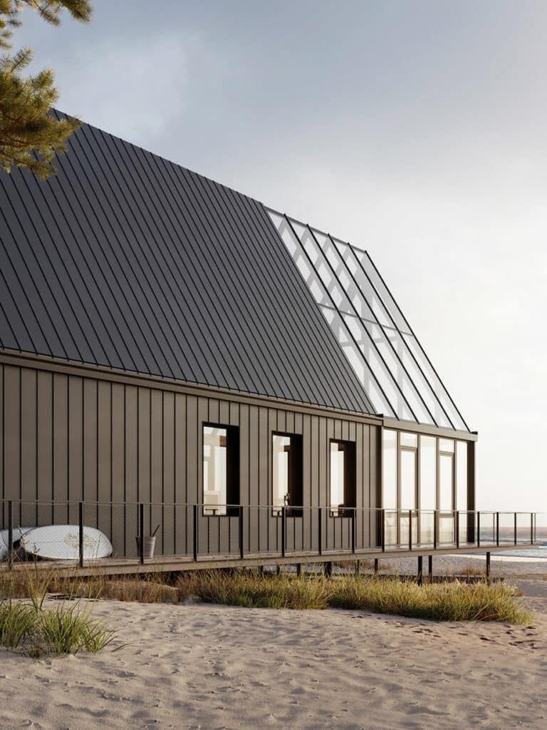 A house on the beach facing the sea.