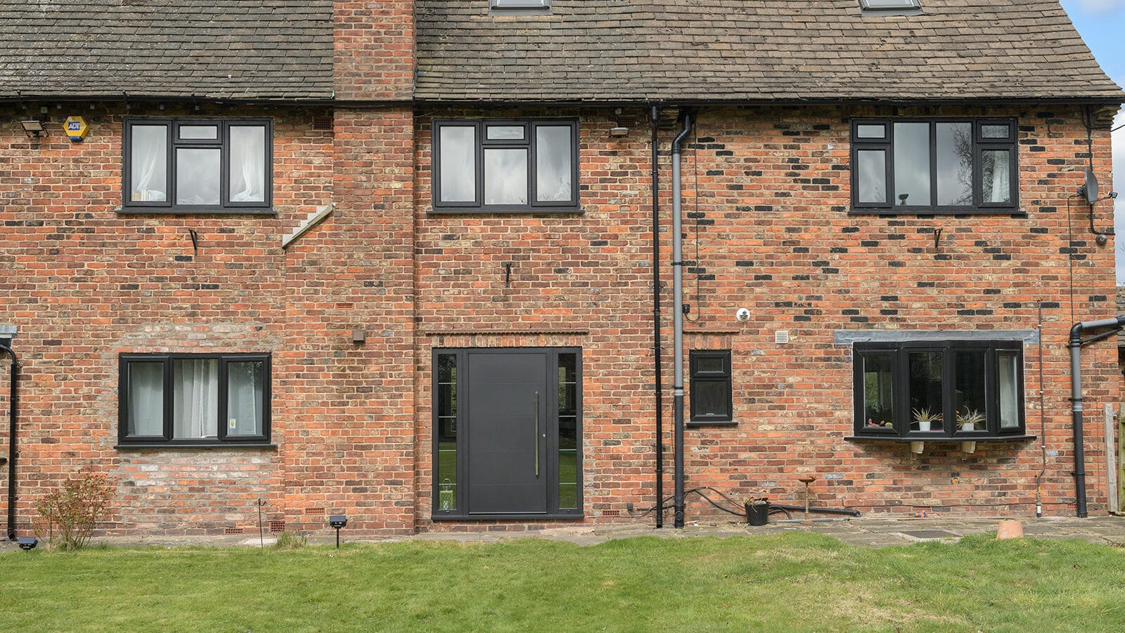 The exterior of a brick house