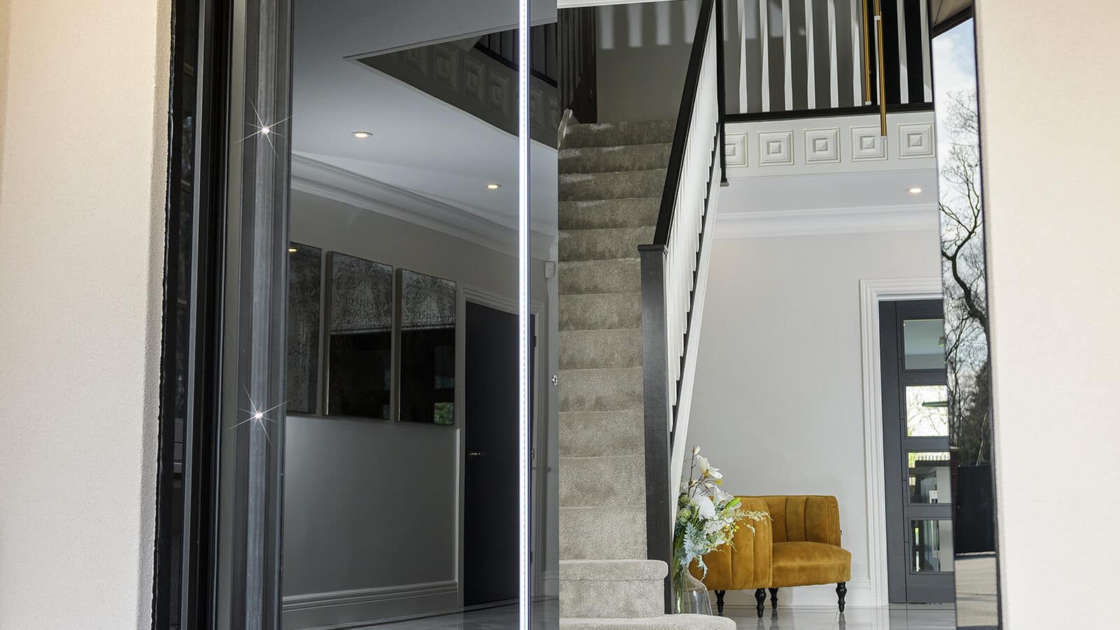 An open black Spitfire Pivot Door